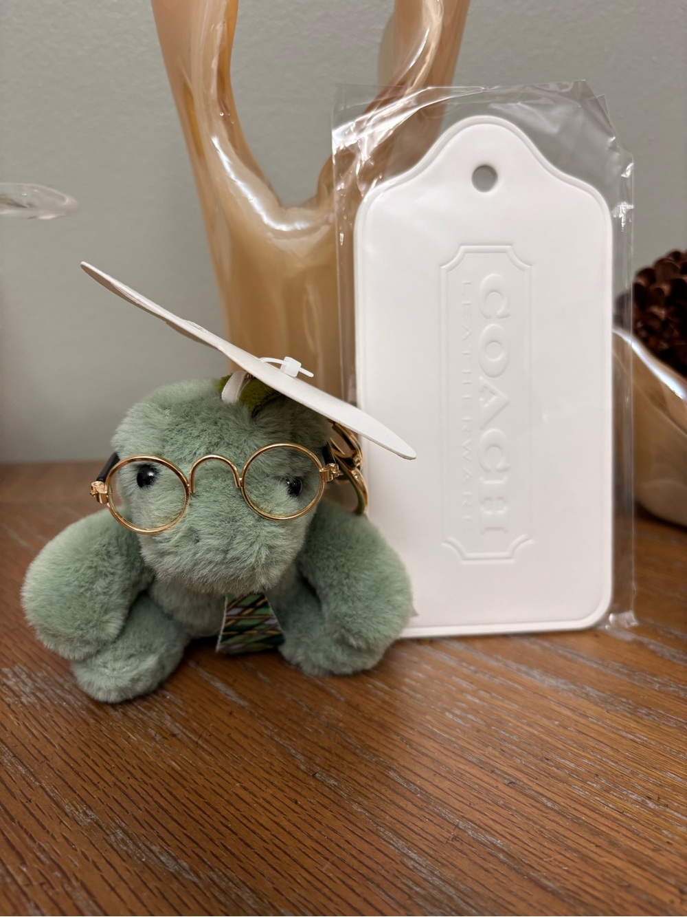 Green Plush dino Keychain with Gold-Tone Glasses - large tag for bag